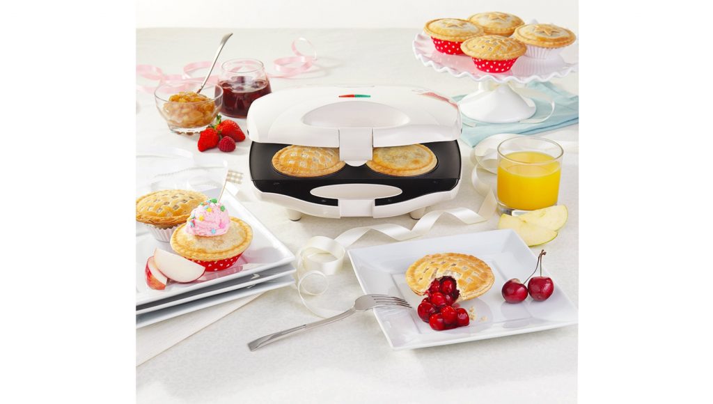 Sophisticated food set-up to support a small appliance packaging shot